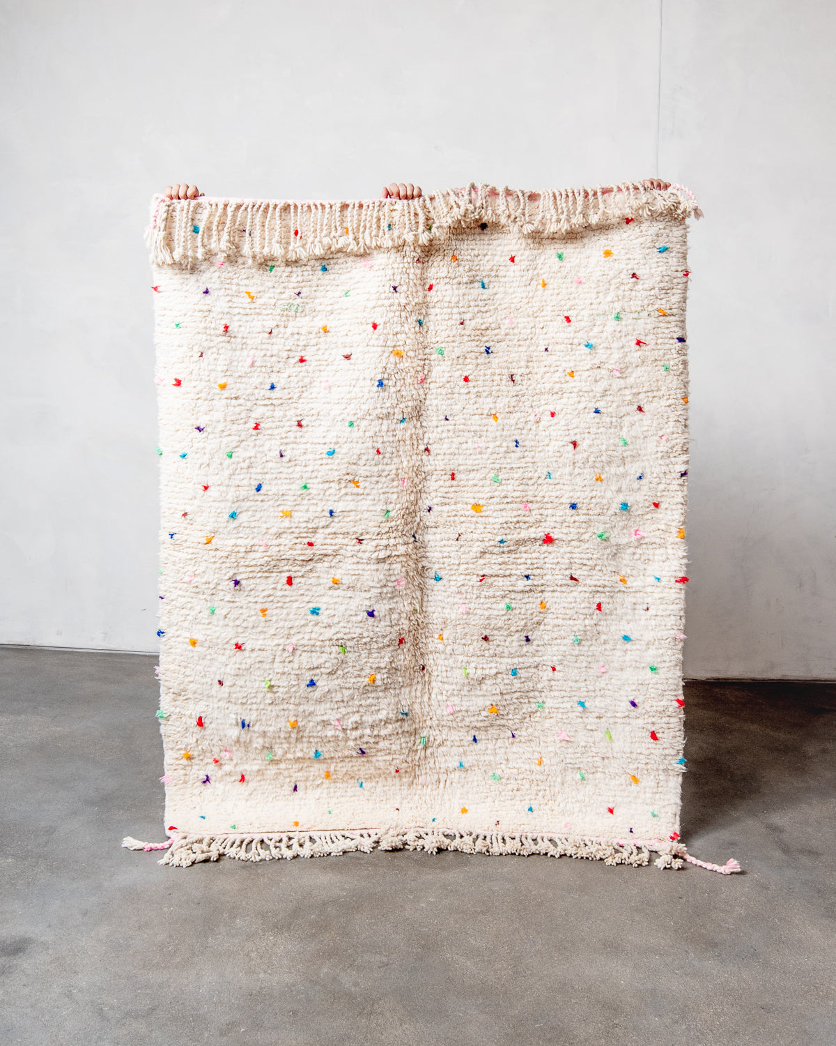 Modern, designer, handcrafted Berber rug from Morocco. Beniourain carpet with beautiful colours and patterns and fluffy wool texture.